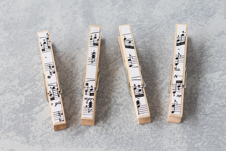 DIY sheet music clothespin magnets. Perfect easy home decor project to make with kids or to give as a gift to a favorite music teacher! #giftidea #sheetmusic #DIYclothespins | https://www.roseclearfield.com