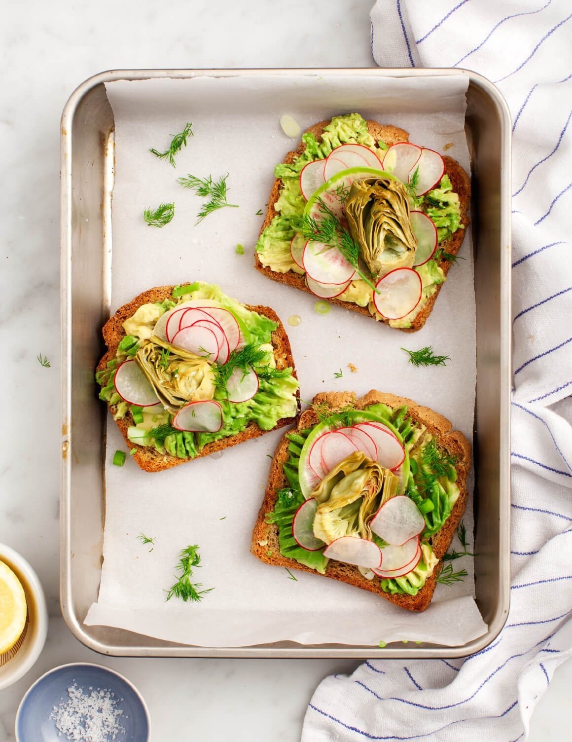 Avocado toast topped with roasted artichokes. So much flavor! via Love and Lemons #avocadotoast #roastedartichokes #healthyeating | https://www.roseclearfield.com