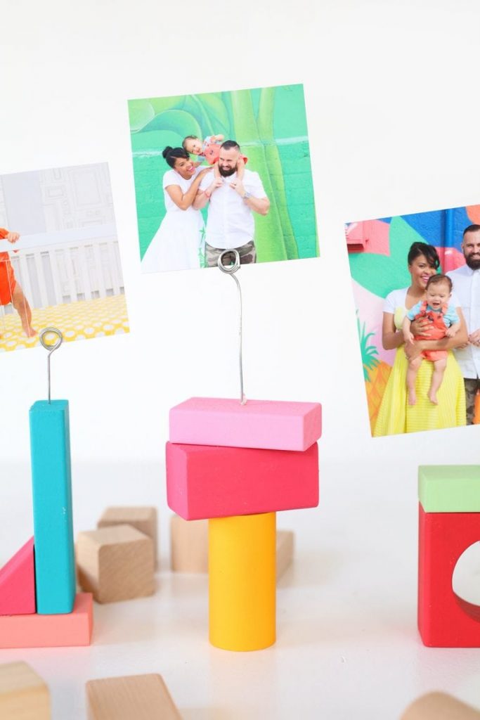 DIY wood block photo holders via Damask Love. So fun and colorful! #DIY #photoholders #popofcolor | https://www.roseclearfield.com