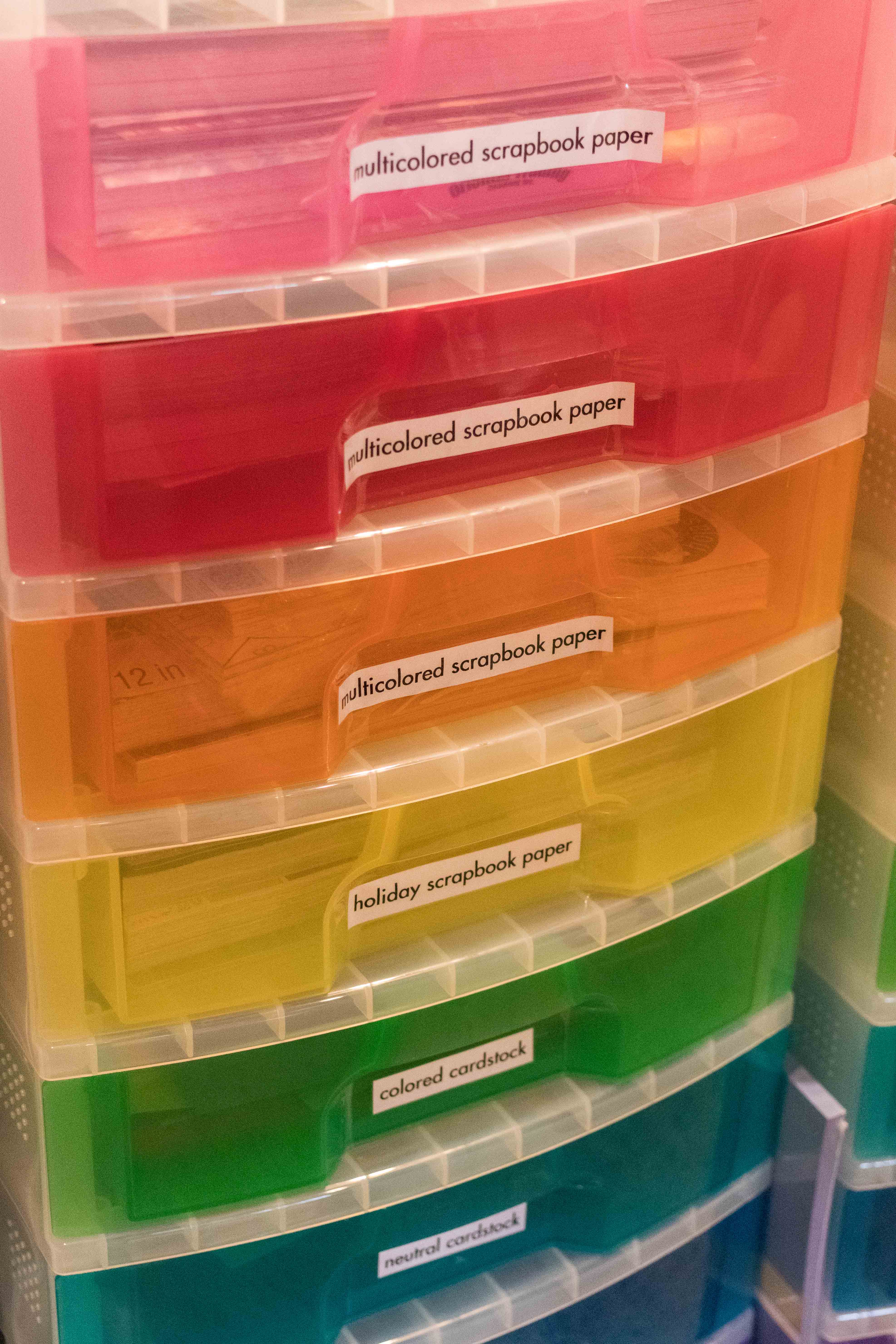 I use the rainbow craft storage units from Michaels for my scrapbook paper, card stock, and other craft supplies. #crafting #craftsupplies #craftstorage | https://www.roseclearfield.com