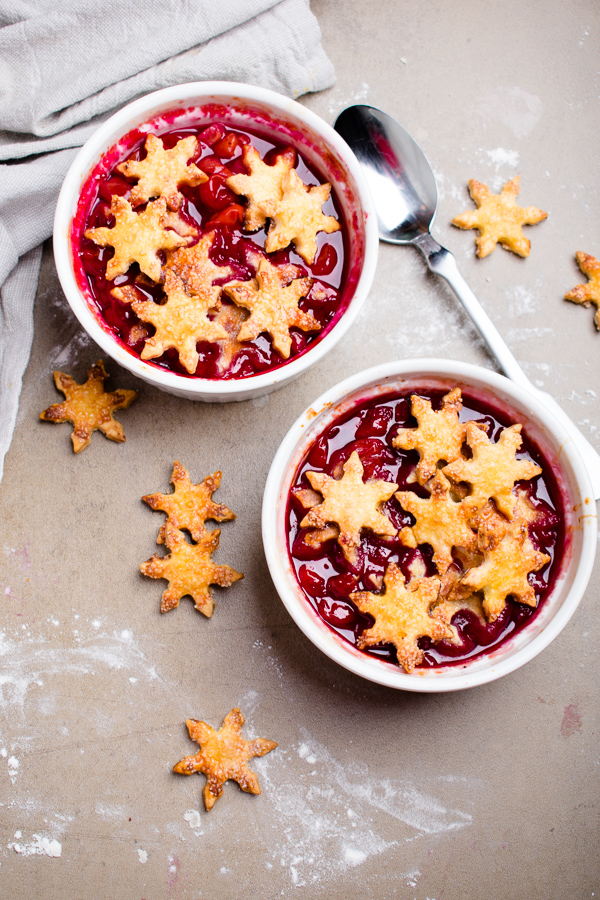 Cherry cobbler for two via Blue Bowl. Adorable and delicious! Perfect for Valentine's Day or a date night. #cherrycobbler #dessertfortwo #datenight | https://www.roseclearfield.com