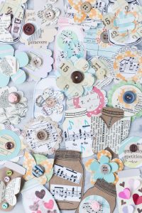 Learn how to make your own scrapbook embellishments! DIY embellishments add a personal touch to scrapbook layouts as well as cards, gift tags, wrapping paper, junk journals, and much more! #DIY #scrapbooking #scrapbookembellishments