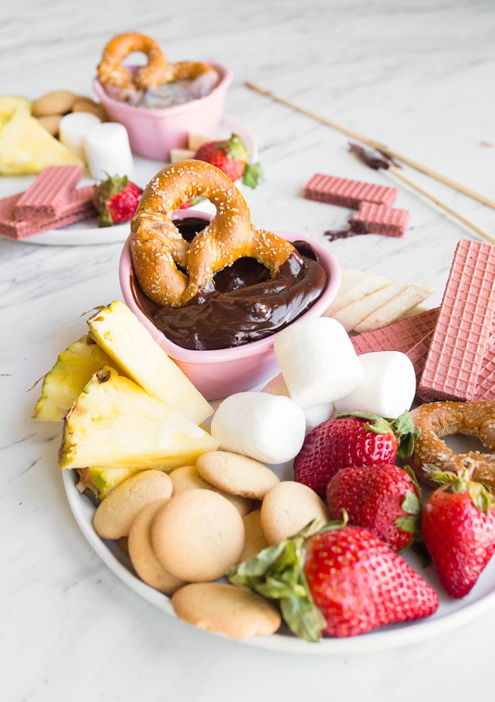 Easy chocolate fondue for two via Dessert for Two. A fun, simple date night dessert! #chocolatefondue #dessertrecipe #datenight | https://www.roseclearfield.com