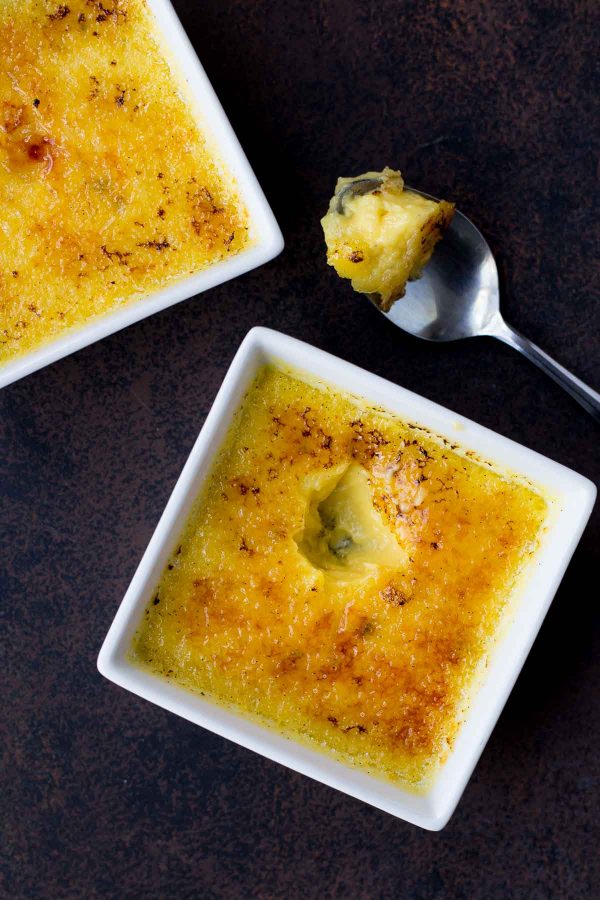 Easy slow cooker creme brulee for two via Rachel Cooks. The simplest way to prepare an amazing date night dessert! #slowcookerdessert #dessertfortwo #cremebrulee | https://www.roseclearfield.com