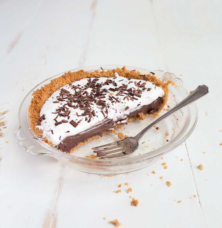 Mini chocolate cream pie for two via Dessert for Two. The perfect serving of rich chocolate cream pie! #chocolatecreampie #minipie #dessertfortwo | https://www.roseclearfield.com