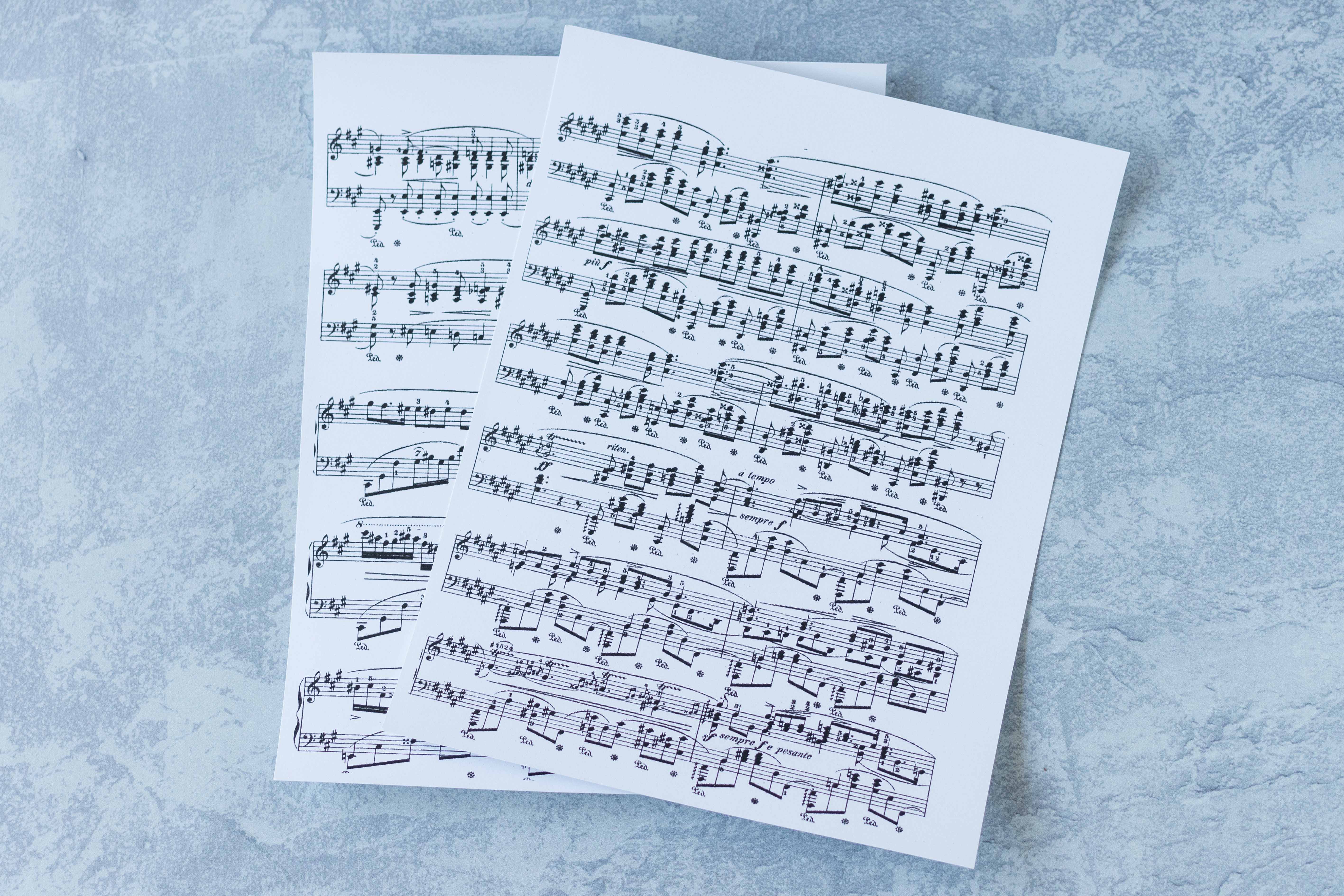 Sheet music printed on white card stock ready to be antiqued for DIY tile coasters. #DIY #tilecoasters #sheetmusiccraft | https://www.roseclearfield.com