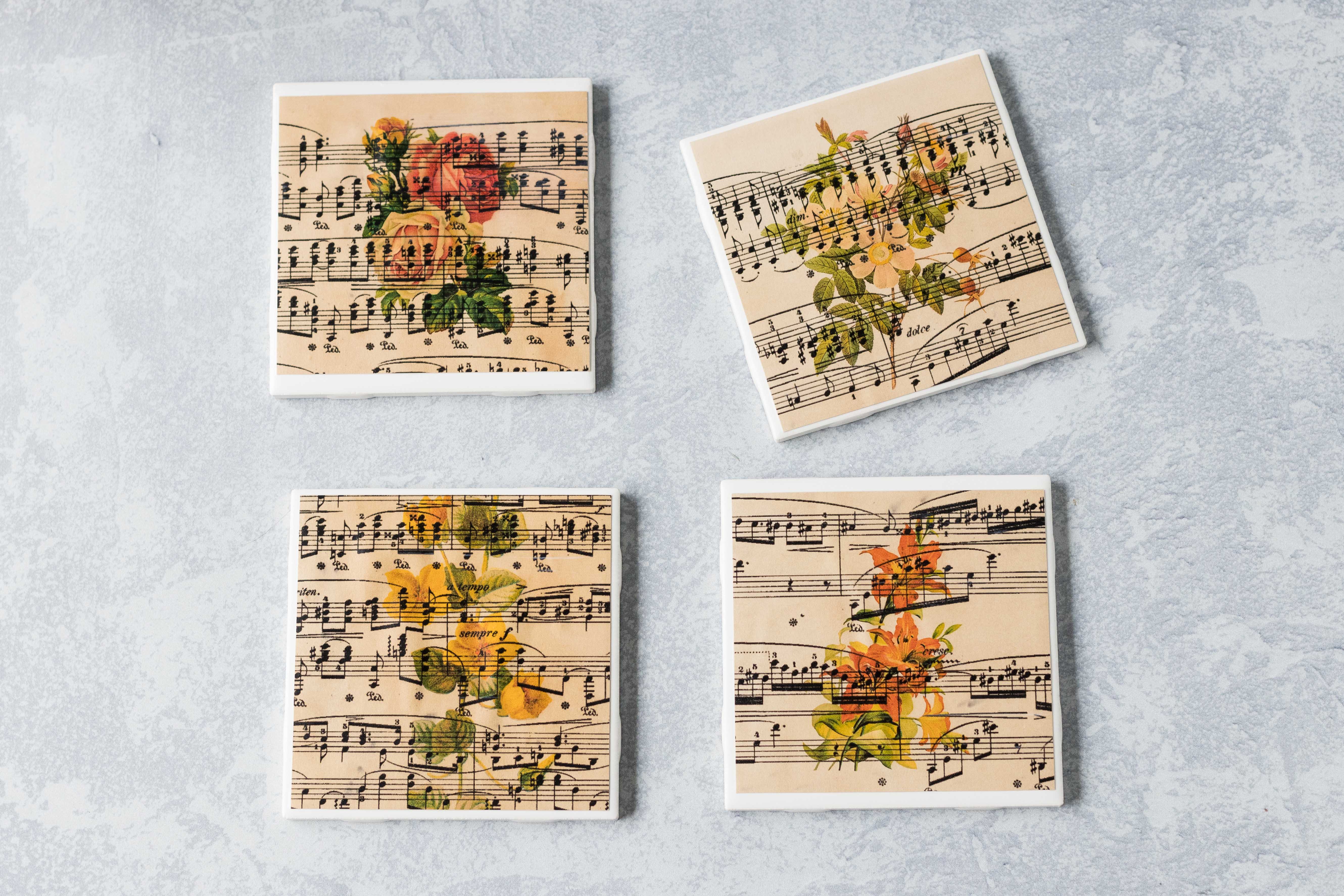 DIY vintage sheet music botanical coasters. Beautiful sheet music craft to give as gifts, sell at craft fairs, or keep for yourself! #DIY #vintagesheetmusic #sheetmusiccraft | https://www.roseclearfield.com