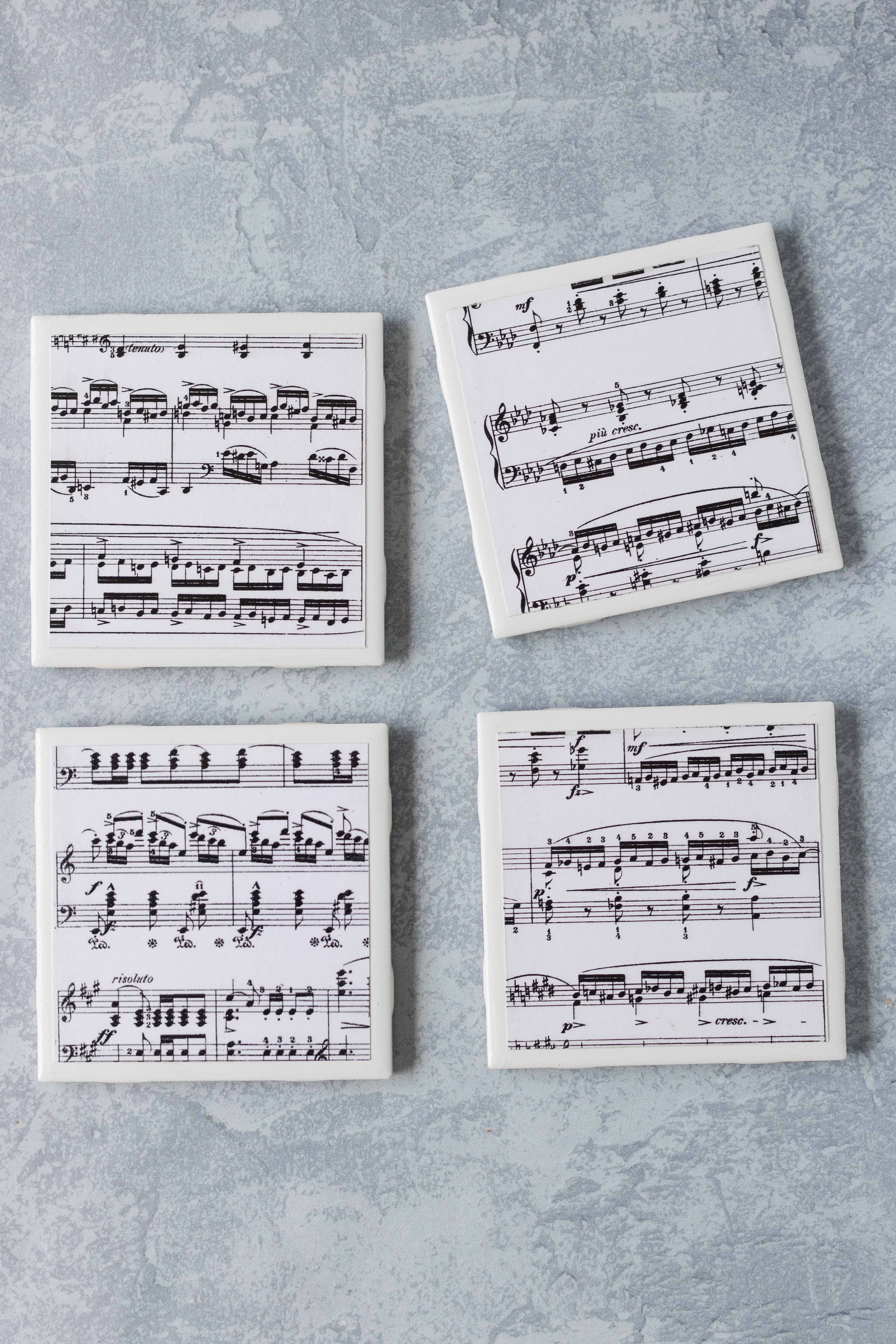 DIY sheet music tile coasters. Simple, fun home decor project! #DIY #sheetmusic #tilecoasters | https://www.roseclearfield.com