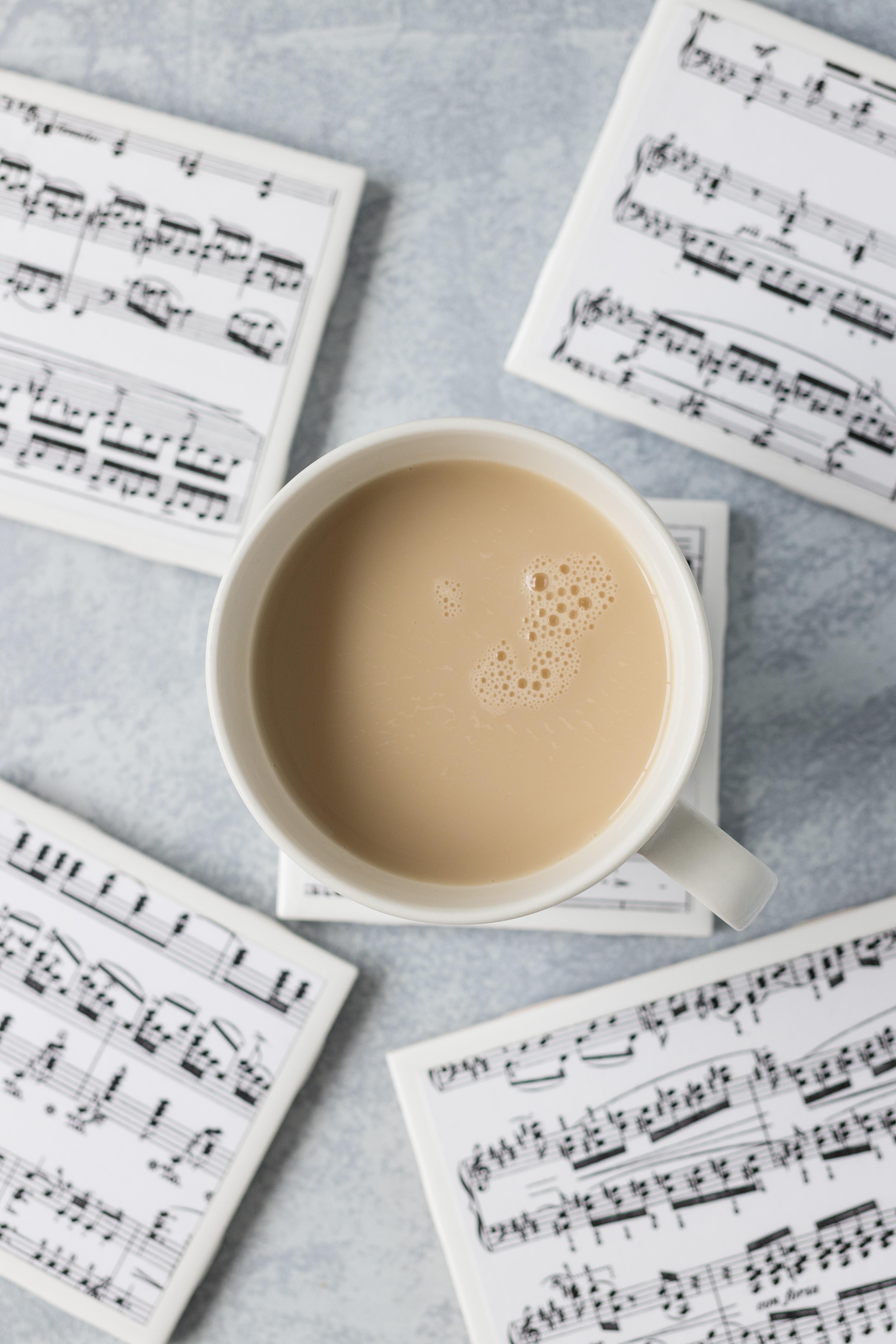 DIY sheet music tile coasters. A simple, fun variation on the classic homemade tile coaster technique! #sheetmusic #DIY #tilecoasters | https://www.roseclearfield.com