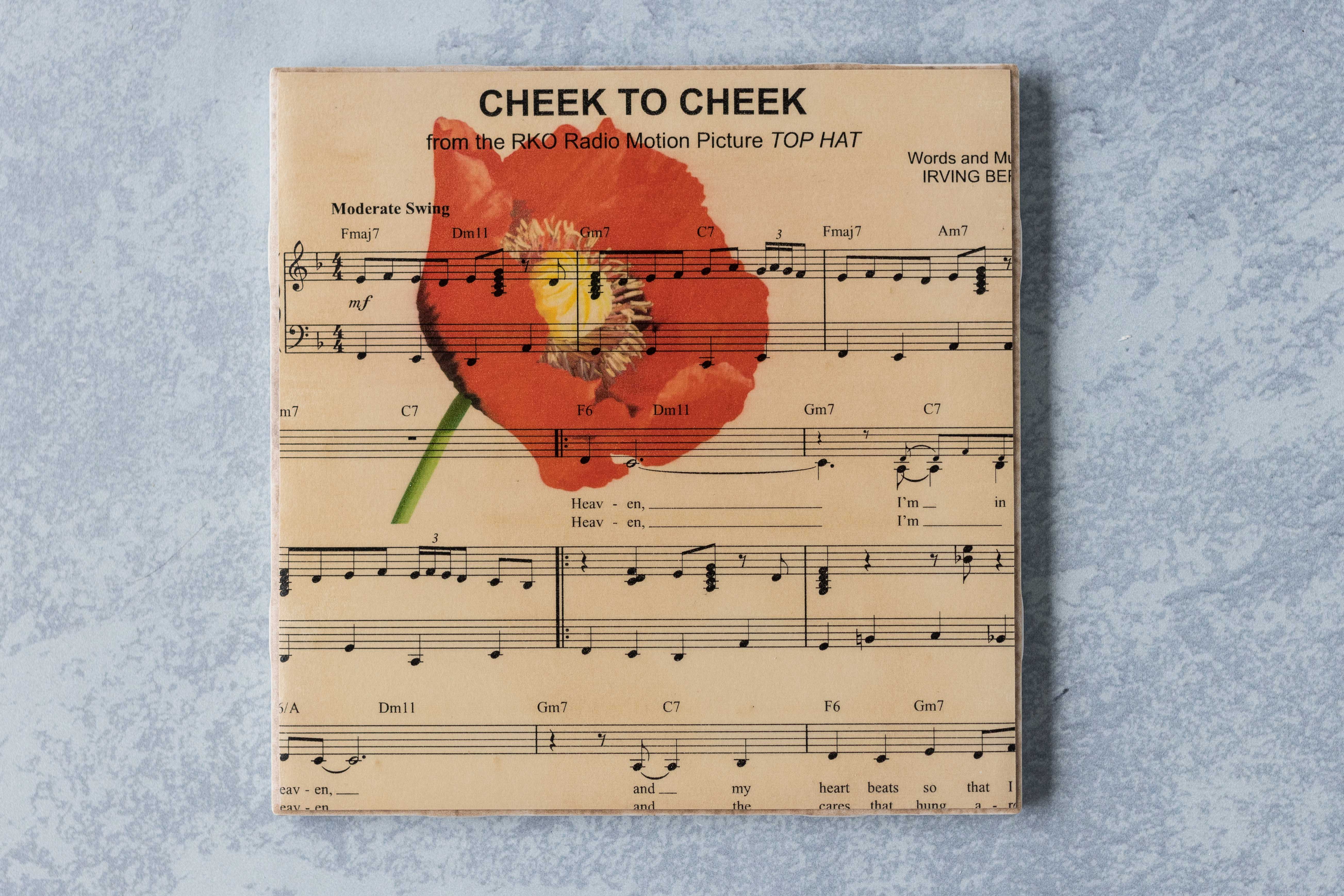 Custom DIY tile coaster with Cheek to Cheek and a vintage poppy image. #DIY #tilecoaster #sheetmusiccraft | https://www.roseclearfield.com