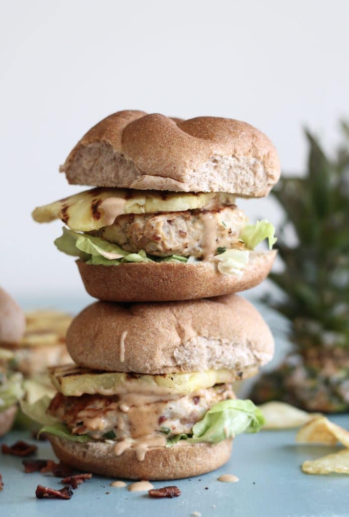 Grilled pineapple bacon chicken burgers, topped with barbecue mayo. A delicious summer dinner! via Spices in My DNA #grilling #chickenburgers #baconburgers | https://www.roseclearfield.com