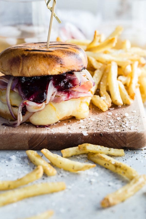 Monte Criso burger topped with smoked ham, blueberry jam, and muenster cheese. Amazing flavor combination! via Foodness Gracious #MonteCristo #burger #grilling | https://www.roseclearfield.com