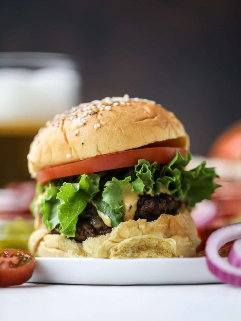 Smoked gouda smash burgers with house sauce from How Sweet Eats. Perfect for summer grilling! #smashburgers #goudaburgers #grilling | https://www.roseclearfield.com