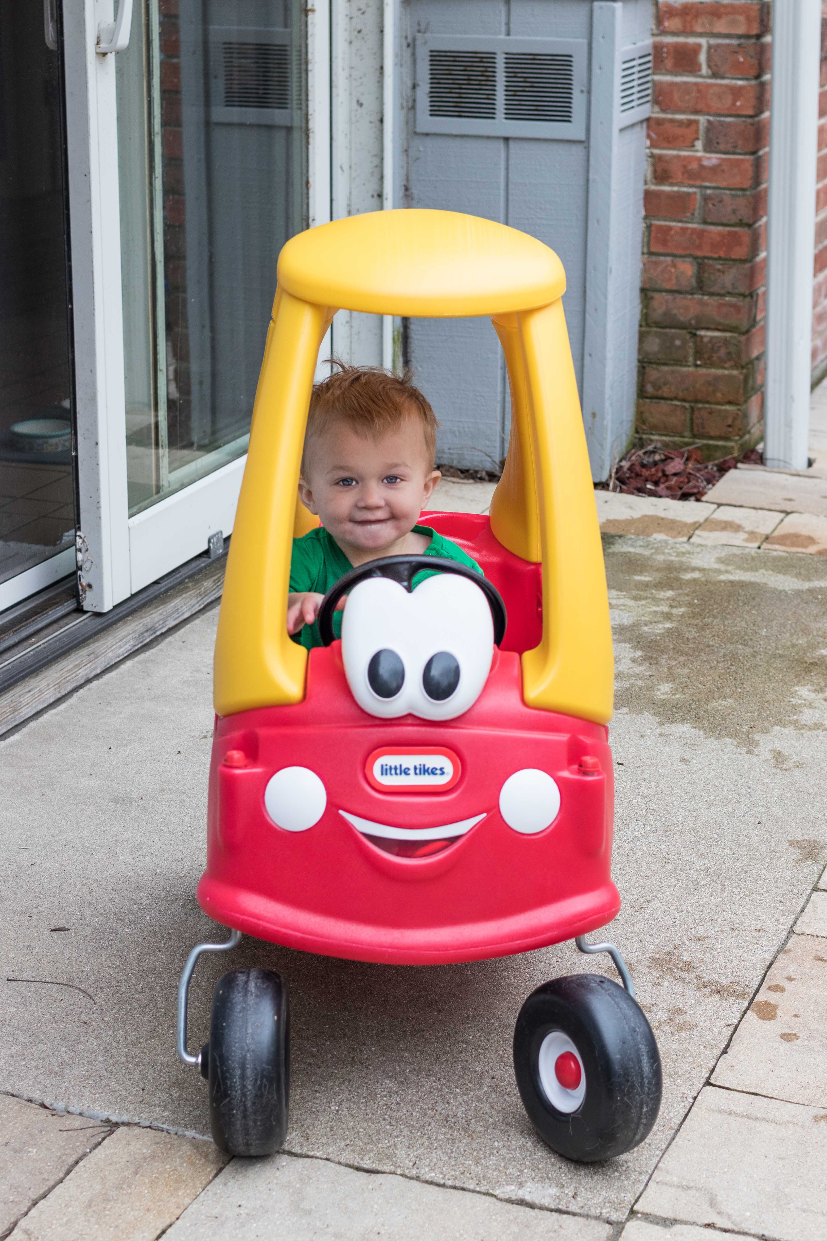 The classic Cozy Coupe is an awesome indoor or outdoor toy for high energy little ones to stay active and develop their gross motor and social skills! #CozyCoupe #besttoddlertoys #outdoortoys #toysforactivetoddlers