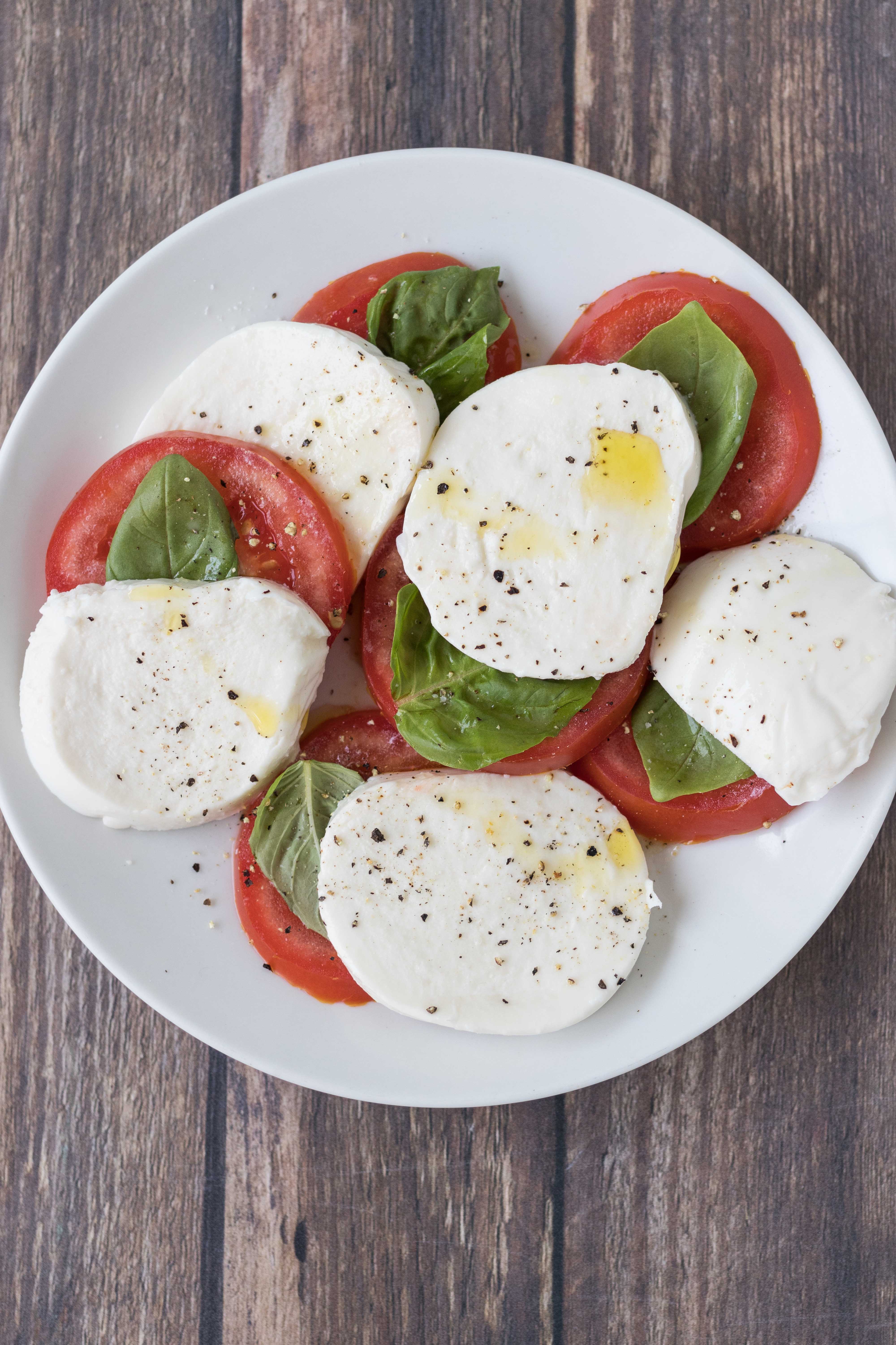 Caprese salad. Easy, healthy summer lunch or dinner! #caprese #capresesalad #capreserecipes | https://www.roseclearfield.com