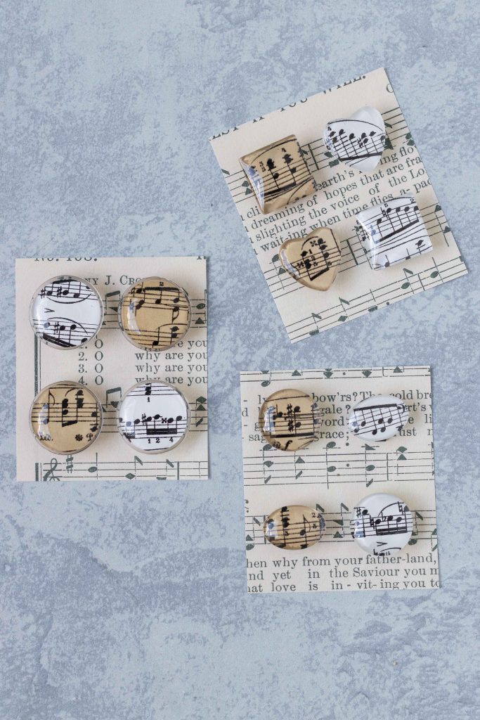 DIY sheet music glass magnets on custom sheet music cards, ready for gifting or selling. #DIY #sheetmusiccraft #glassmagnets