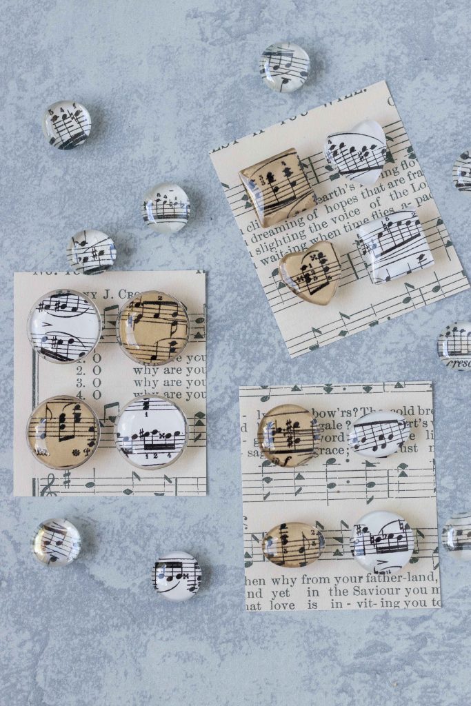 DIY sheet music glass magnets. Easy home decor to make with kids! #DIY #sheetmusic #glassmagnets