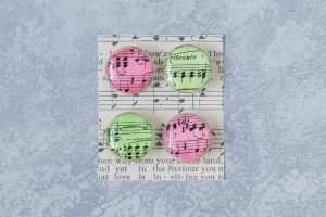 DIY Christmas sheet music glass magnets. An easy, festive craft project to give as gifts or sell on Etsy or at craft fairs. #DIY #sheetmusic #Christmascraft | https://www.roseclearfield.com
