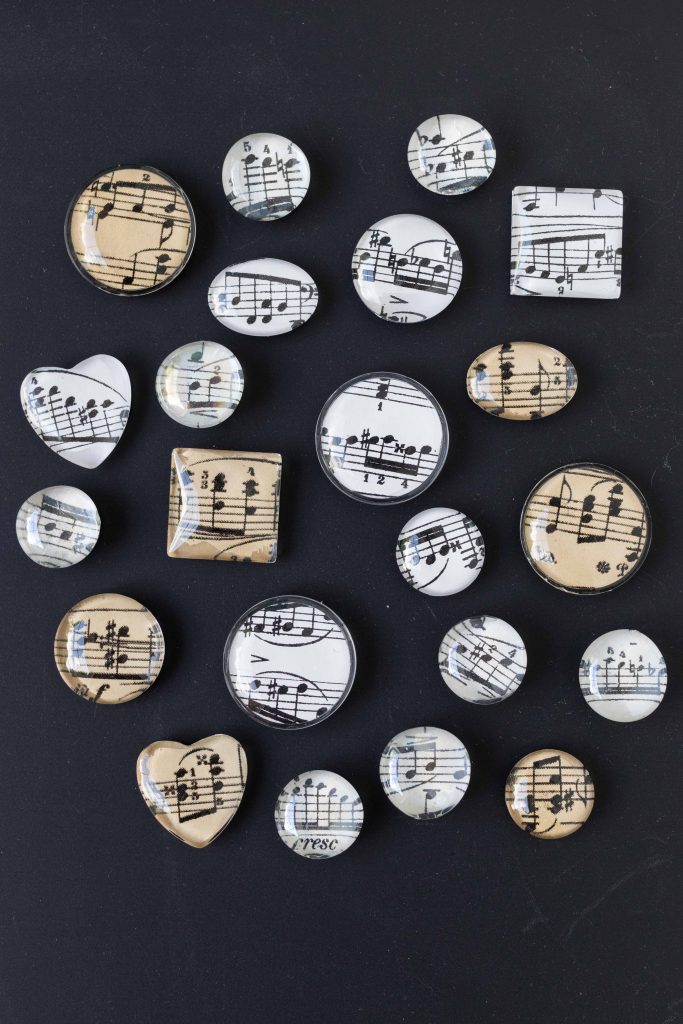 DIY sheet music glass magnets. Easy home decor project to sell or give as gifts or party favors! #sheetmusic #glassmagnets #DIY | https://www.roseclearfield.com