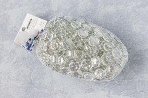 Decorate vase fillers are a perfect, cheap medium for creating homemade glass magnets. #DIY #craftproject #vasefillers | https://www.roseclearfield.com