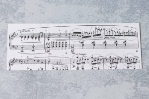 Sheet music ready for DIY glass magnets. #sheetmusic #upcycled #craftproject | https://www.roseclearfield.com