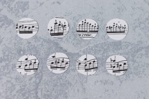 Sheet music circles, ready to be made into glass magnets. #DIY #glassmagnets #sheetmusiccraft | https://www.roseclearfield.com