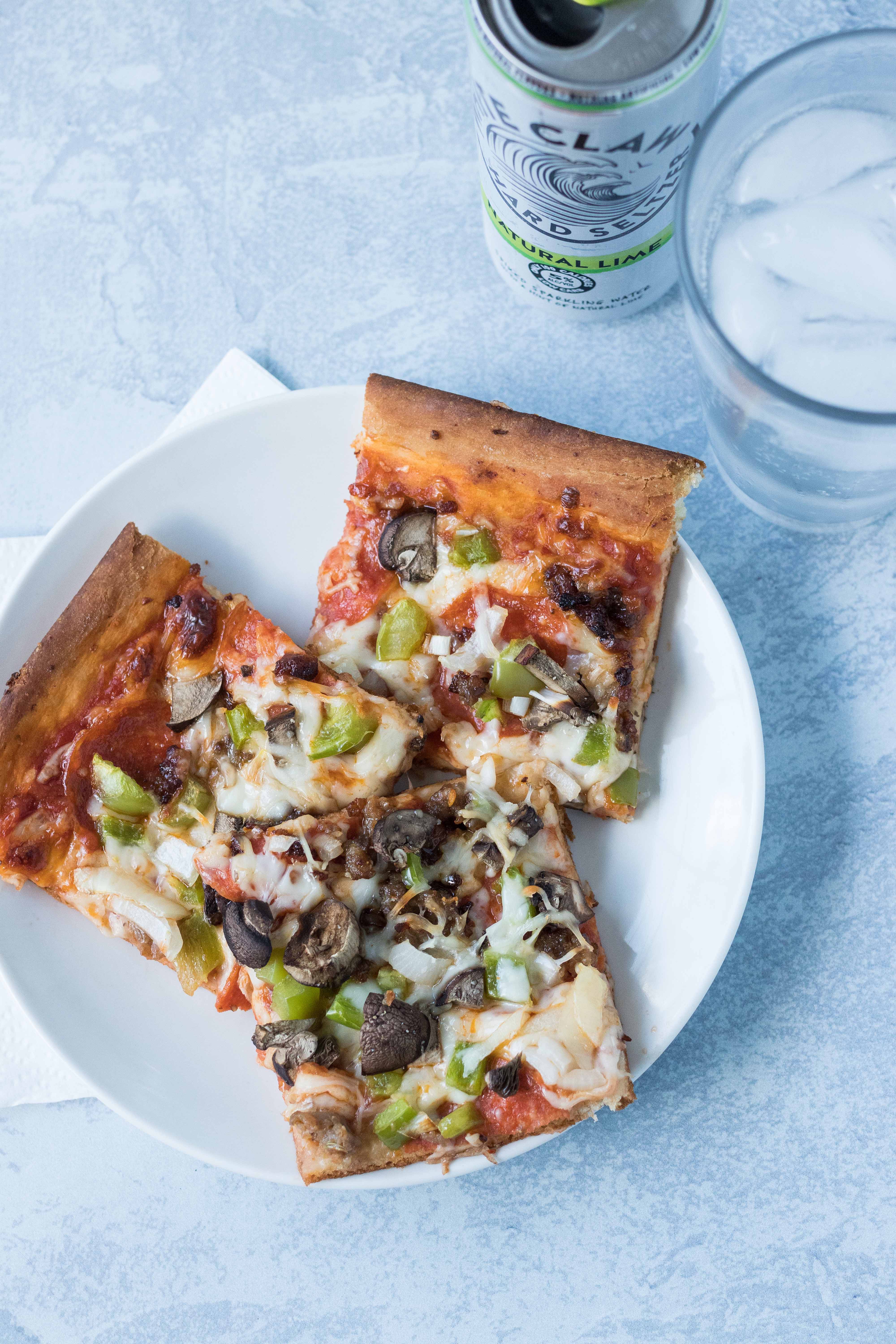 Homemade supreme pizza is a quick, nutritious dinner idea for busy weeknights! #homemadepizza #supremepizza #familyfriendly | https://www.roseclearfield.com