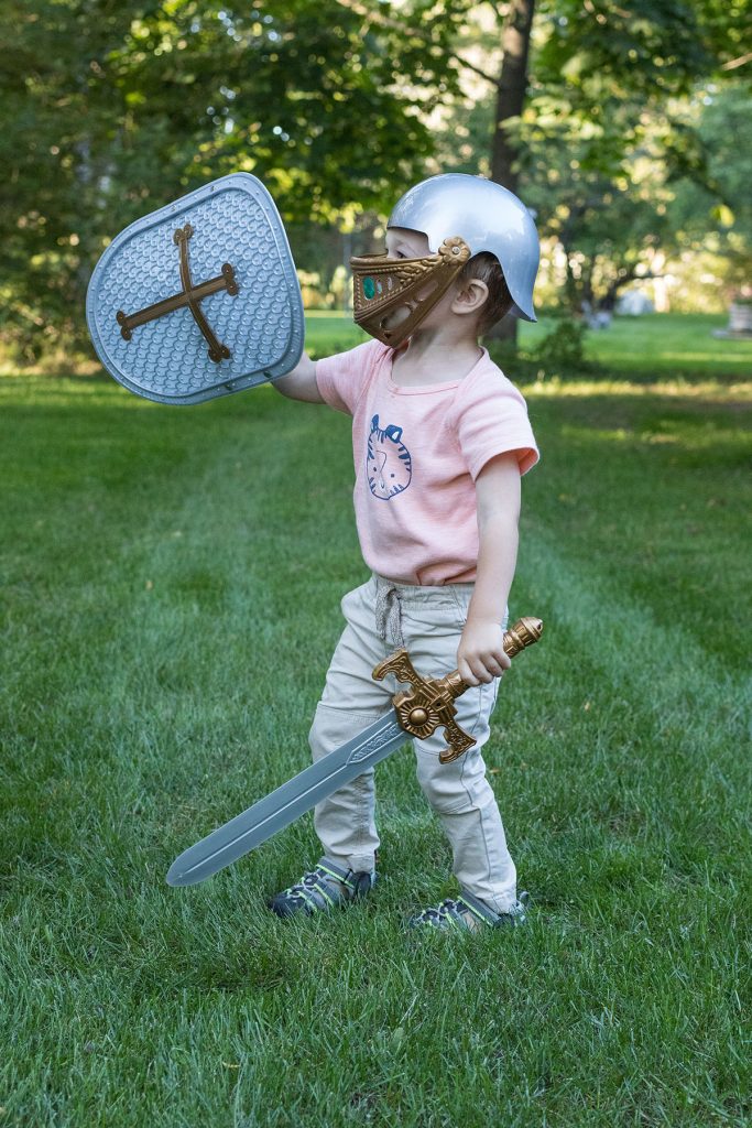 Toddler with Toy Armor