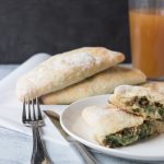 Cheesy Spinach Sausage Calzones