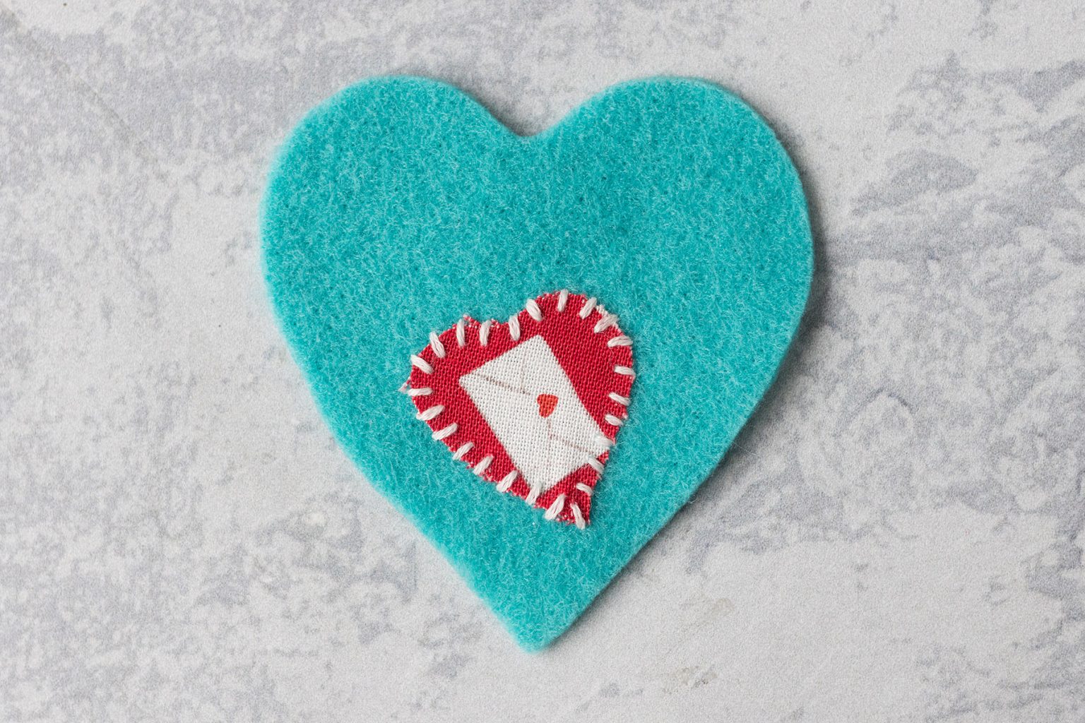 DIY Felt Heart Ornaments for Valentine's Day • Rose Clearfield