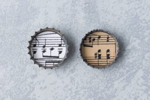 DIY Sheet Music Bottlecap Pendant Necklaces in Progress