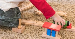 Tommy with the Wooden Train Set