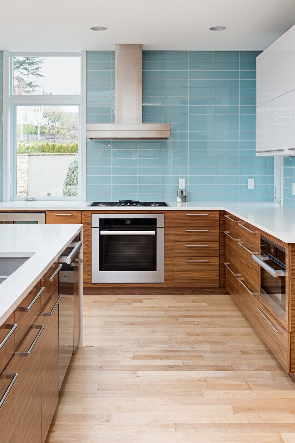 Light Blue Backsplash in Modern Kitchen - Rose Clearfield