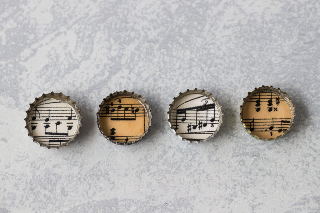 Bottle Cap Sheet Music Magnets