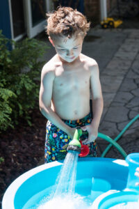 Tommy Filling the Water Table