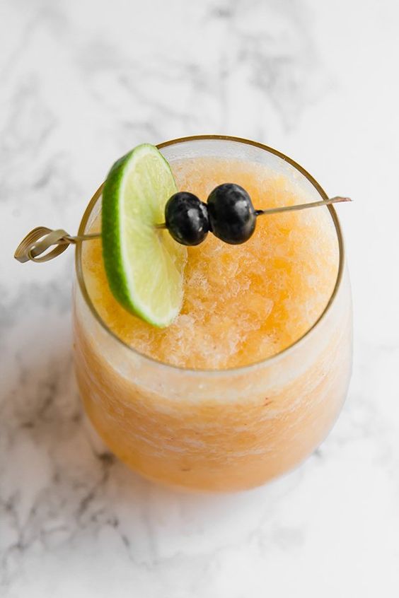 Frozen Peach Bellini Mocktail Unbound Wellness