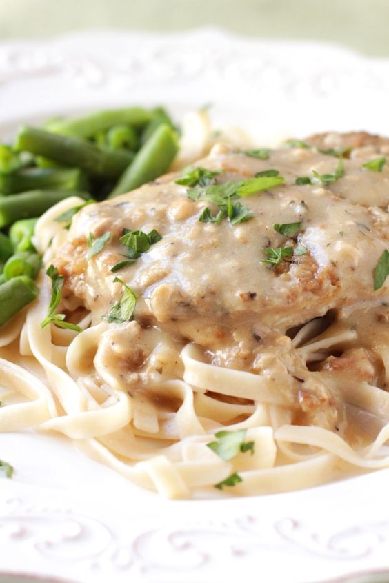 Slow Cooker Pork Chops and Herb Gravy Delicious As It Looks