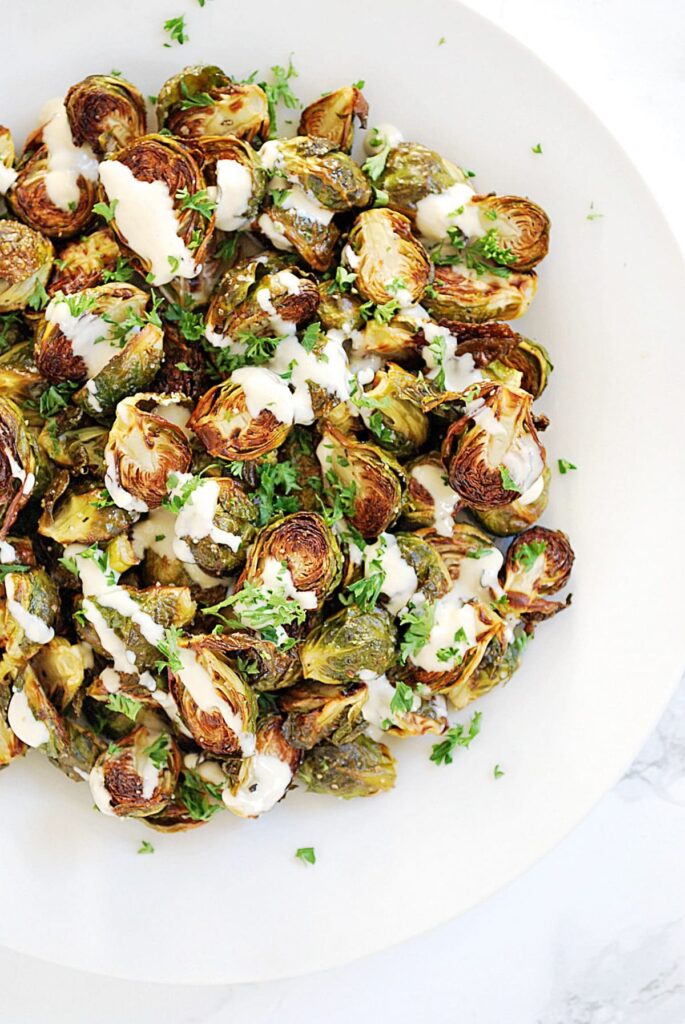 Roasted Brussels Sprouts with Lemon Tahini Sauce Love and Good Stuff